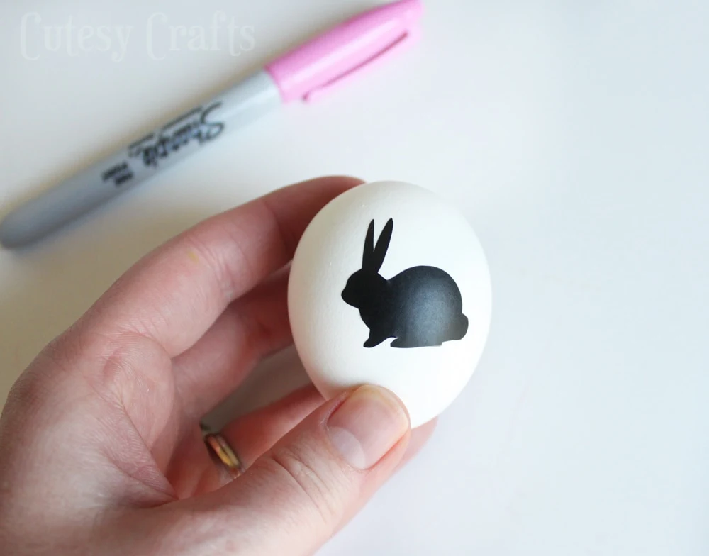 Sharpie Easter Egg Decorating Idea - Use a sticker or vinyl to make a stencil!