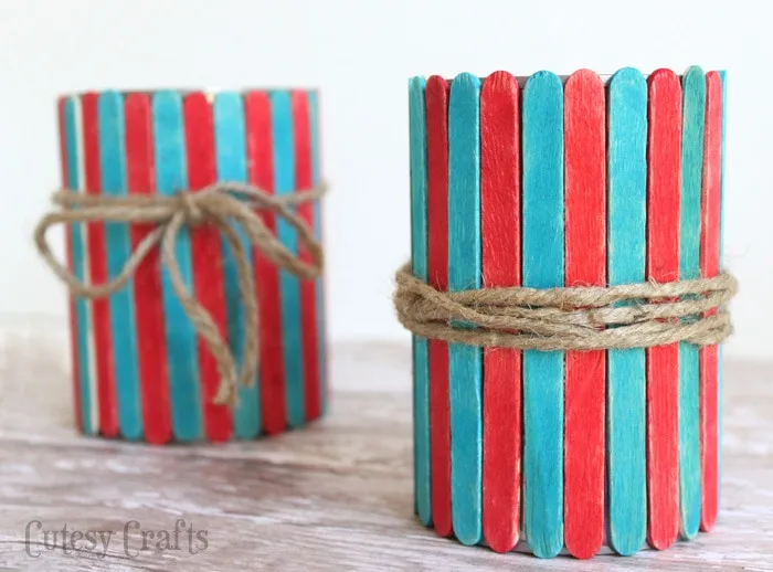 Popsicle Stick Vases - Fun 4th of July craft for the kids!  Use them to hold cut flowers or as utencil holders at your 4th of July party.