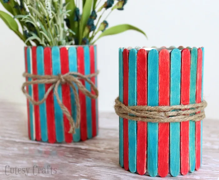 Popsicle Stick Vases - Fun 4th of July craft for the kids!  Use them to hold cut flowers or as utencil holders at your 4th of July party.