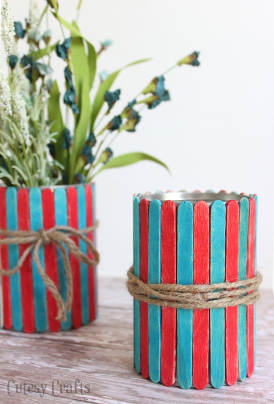 Popsicle Stick Vases - Fun 4th of July craft for the kids!  Use them to hold cut flowers or as utencil holders at your 4th of July party.