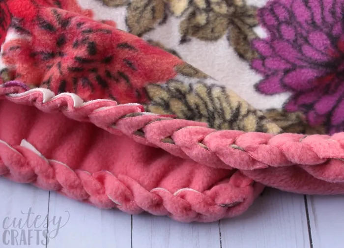 Make a no-sew fleece blanket with a braided edge.