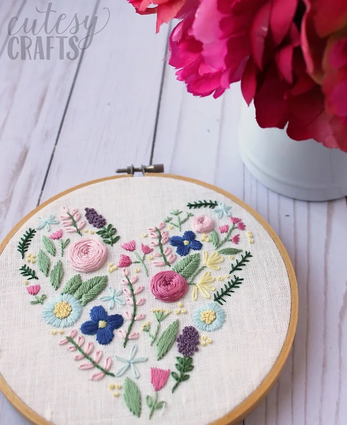 Free Hand embroidery design of heart and flowers - Pintangle