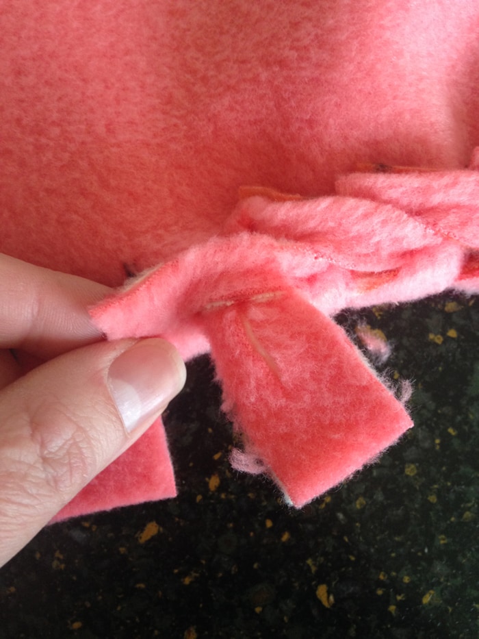 How to Make No-Sew Fleece Blankets with a Braided Edge - Cutesy Crafts