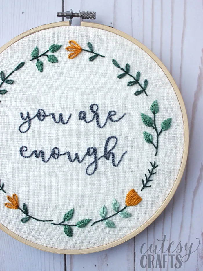 Hand embroidered Stitch finished on a 4 inch embroidery hoop (I