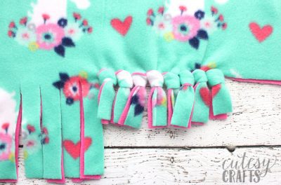 How to Make a Tie Blanket from Fleece - Cutesy Crafts