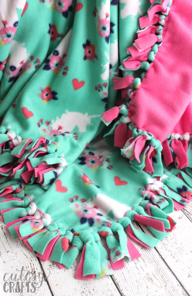 How to Make a Tie Blanket from Fleece - Cutesy Crafts