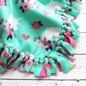 How to Make a Tie Blanket from Fleece - Cutesy Crafts