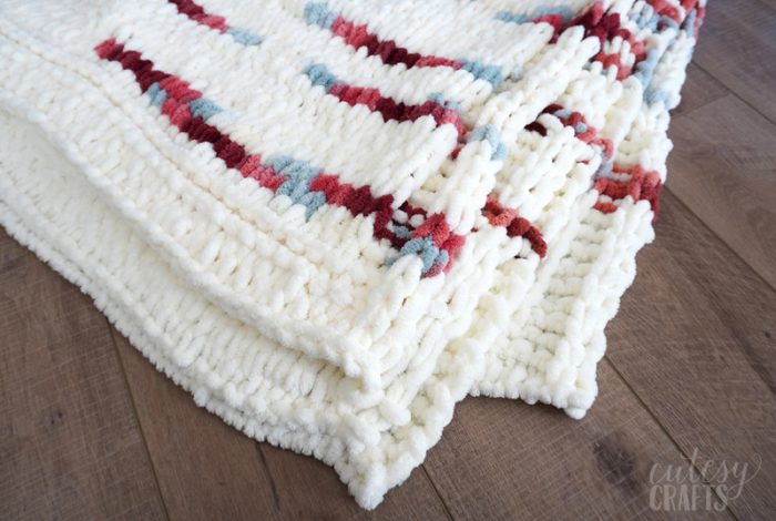 How to Make a Loop Yarn Blanket - Cutesy Crafts