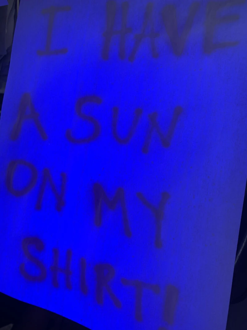 How to make a secret message using bleach and a black light.