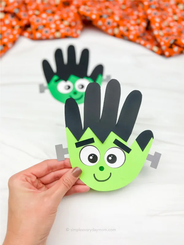 Handprint Halloween craft for kids.